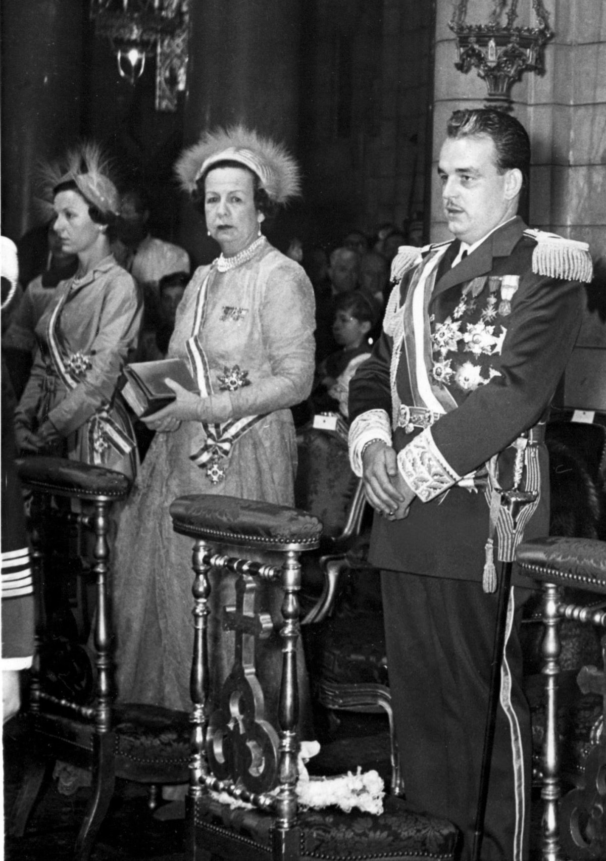 Princess Antoinette, Princess Charlotte, and Prince Rainier III of Monaco are pictured during his enthronement ceremonies, April 1950 (Everett Collection/Alamy)
