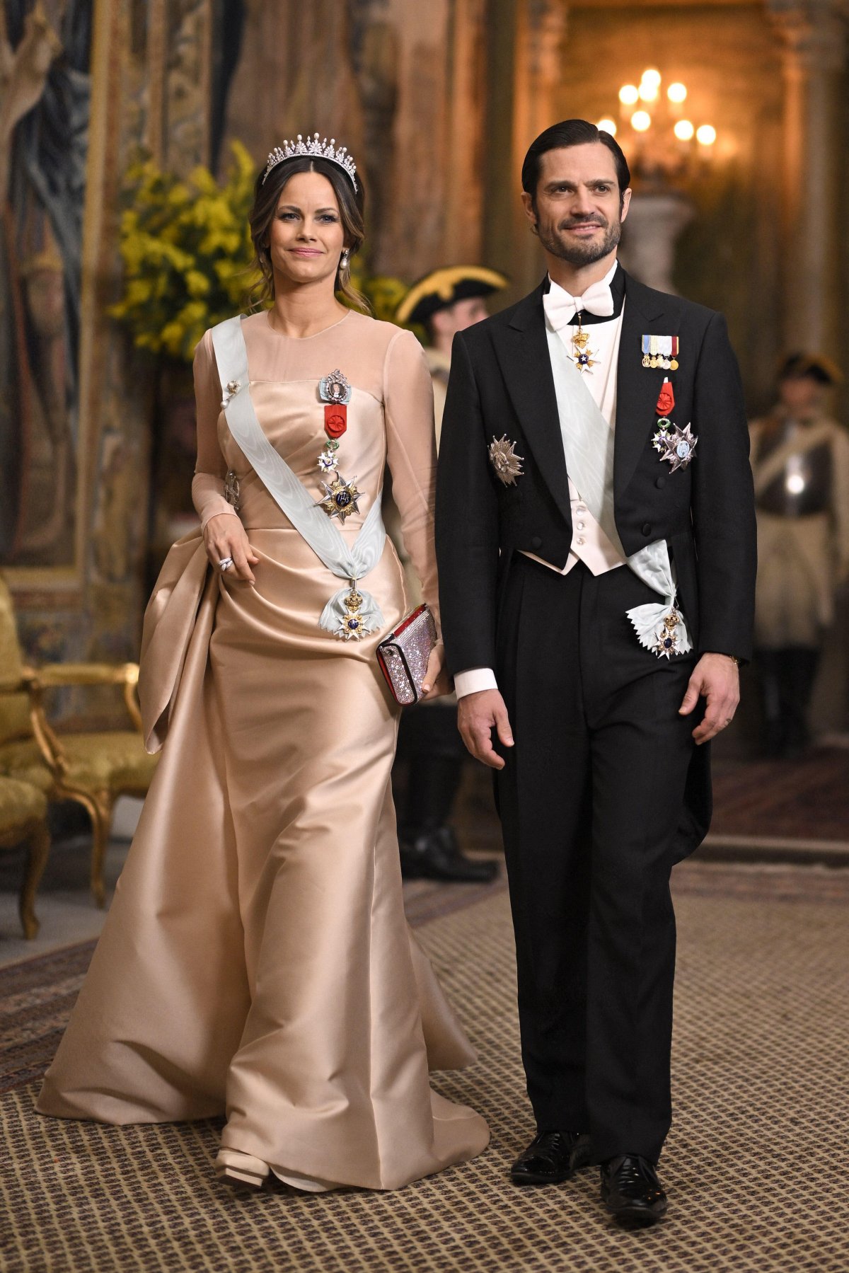 Princess Sofia and Prince Carl Philip of Sweden arrive for a state banquet at the Royal Palace in Stockholm on January 30, 2024 (Eliot Blondet/Abaca Press/Alamy)