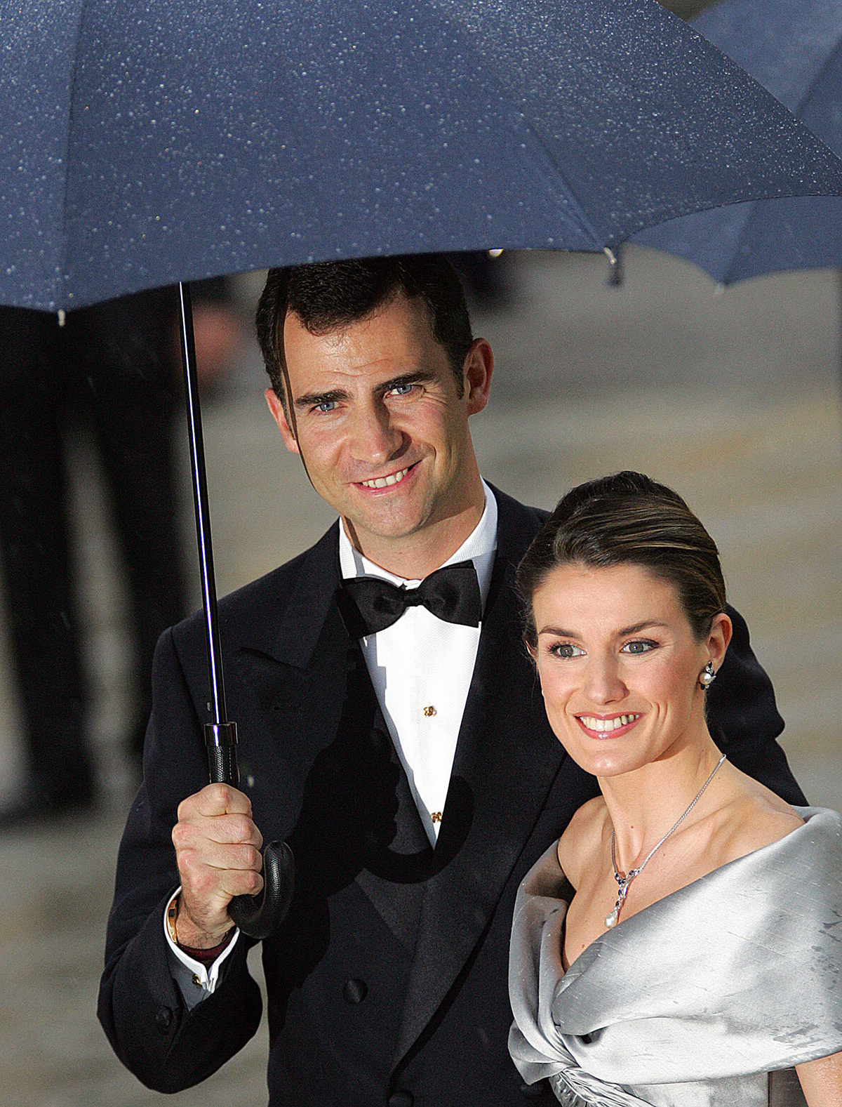 The Prince of Asturias and Letizia Ortiz Rocasolano attend an official dinner at the Royal Palace of El Pardo on the eve of their royal wedding in Madrid, May 21, 2004 (ODD ANDERSEN/AFP/Getty Images)