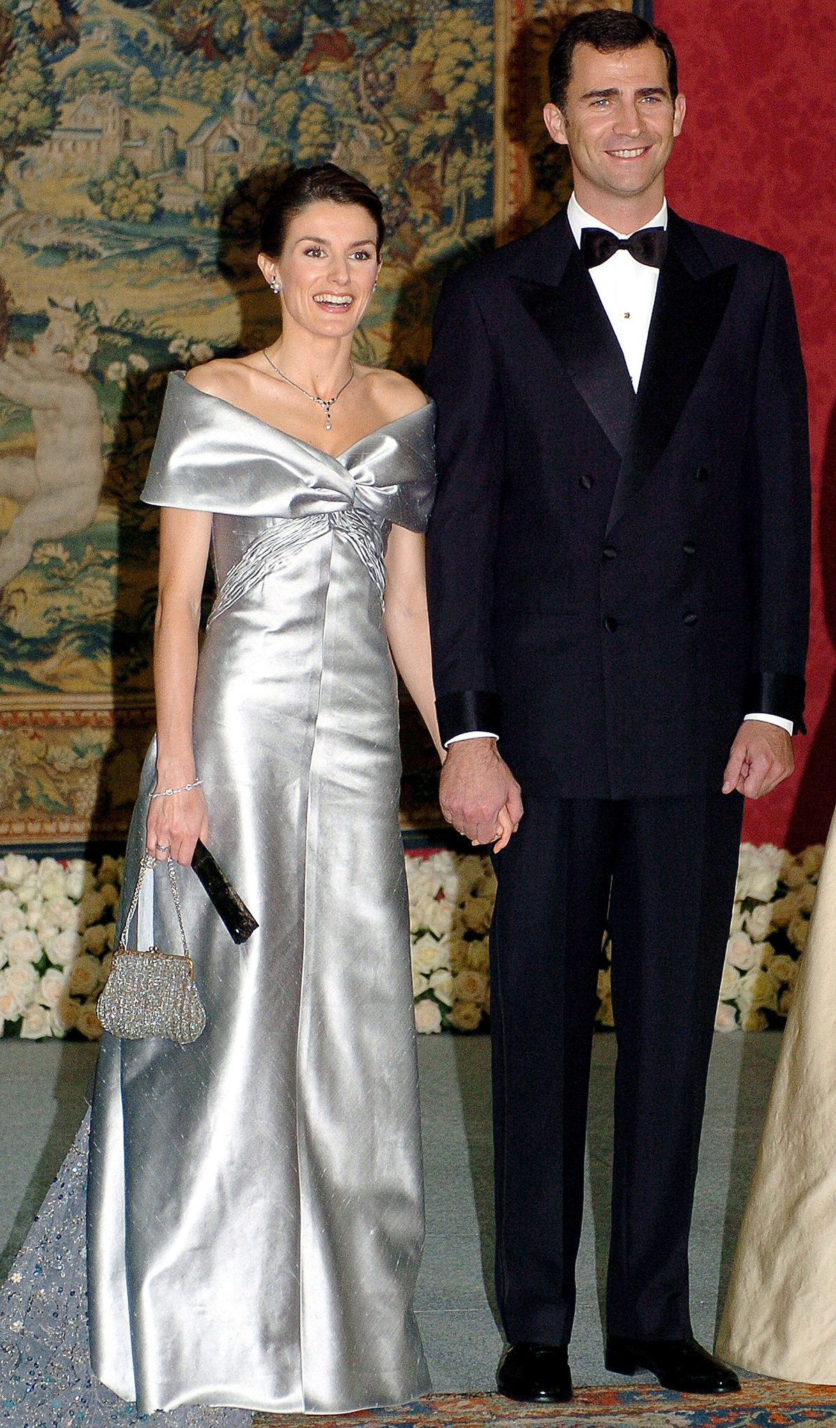 The Prince of Asturias and Letizia Ortiz Rocasolano attend an official dinner at the Royal Palace of El Pardo on the eve of their royal wedding in Madrid, May 21, 2004 (Alberto Martin/POOL/Getty Images)