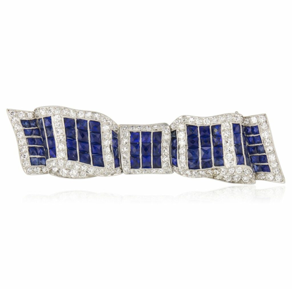 Sir Elton John’s Bejeweled Rock and Roll Brooches Head to the Auction Block