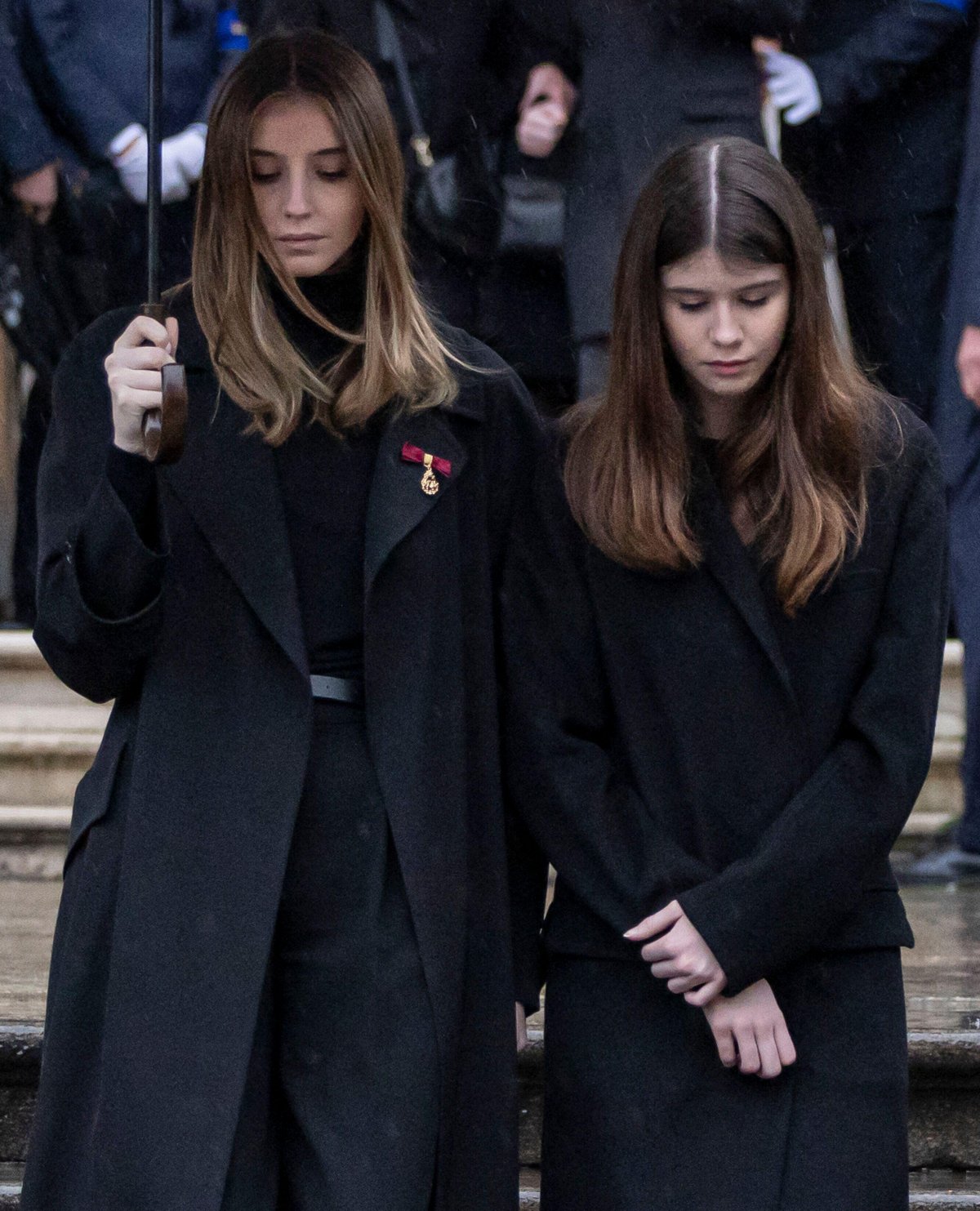 Vittoria di Savoia and Luisa di Savoia attend the funeral of their grandfather, Vittorio Emanuele di Savoia, in Turin on February 10, 2024 (Marco Piovanotto/Abaca Press/Alamy)
