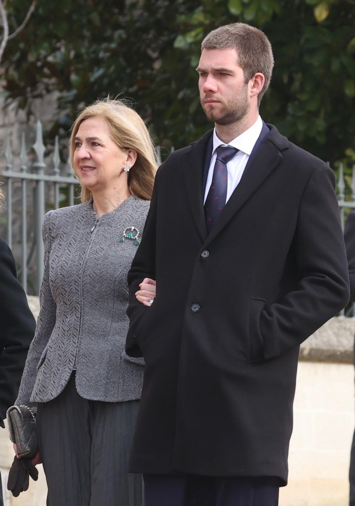 Infanta Cristina of Spain and her son, Juan Urdangarin y Borbón, attend a memorial service in honor of her late uncle, King Constantine II of Greece, at St. George's Chapel, Windsor on February 27, 2024 (Jack Abuin/Zuma Press/Alamy)