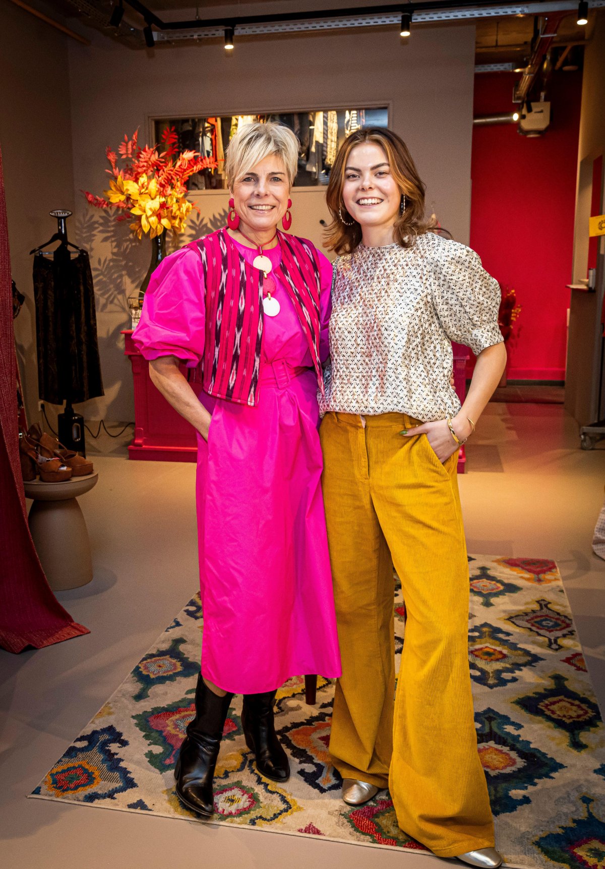 Princess Laurentien of the Netherlands and her daughter, Countess Eloise of Orange-Nassau, pose during a press presentation of their vintage clothing shop, My Lima Lima, in The Hague on March 1, 2024 (Patrick van Katwijk/DPA Picture Alliance/Alamy)
