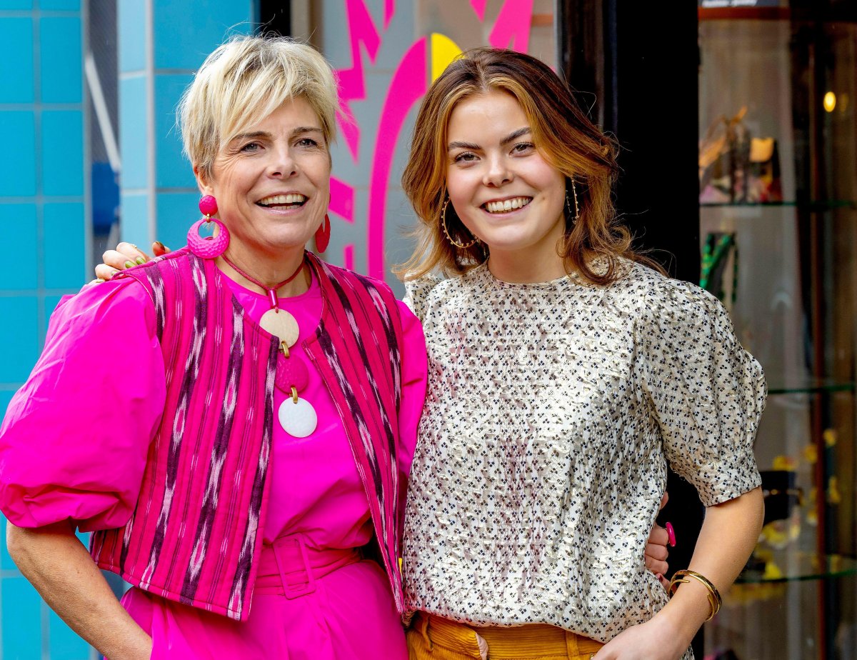 Princess Laurentien of the Netherlands and her daughter, Countess Eloise of Orange-Nassau, pose during a press presentation of their vintage clothing shop, My Lima Lima, in The Hague on March 1, 2024 (Albert Nieboer/DPA Picture Alliance/Alamy)