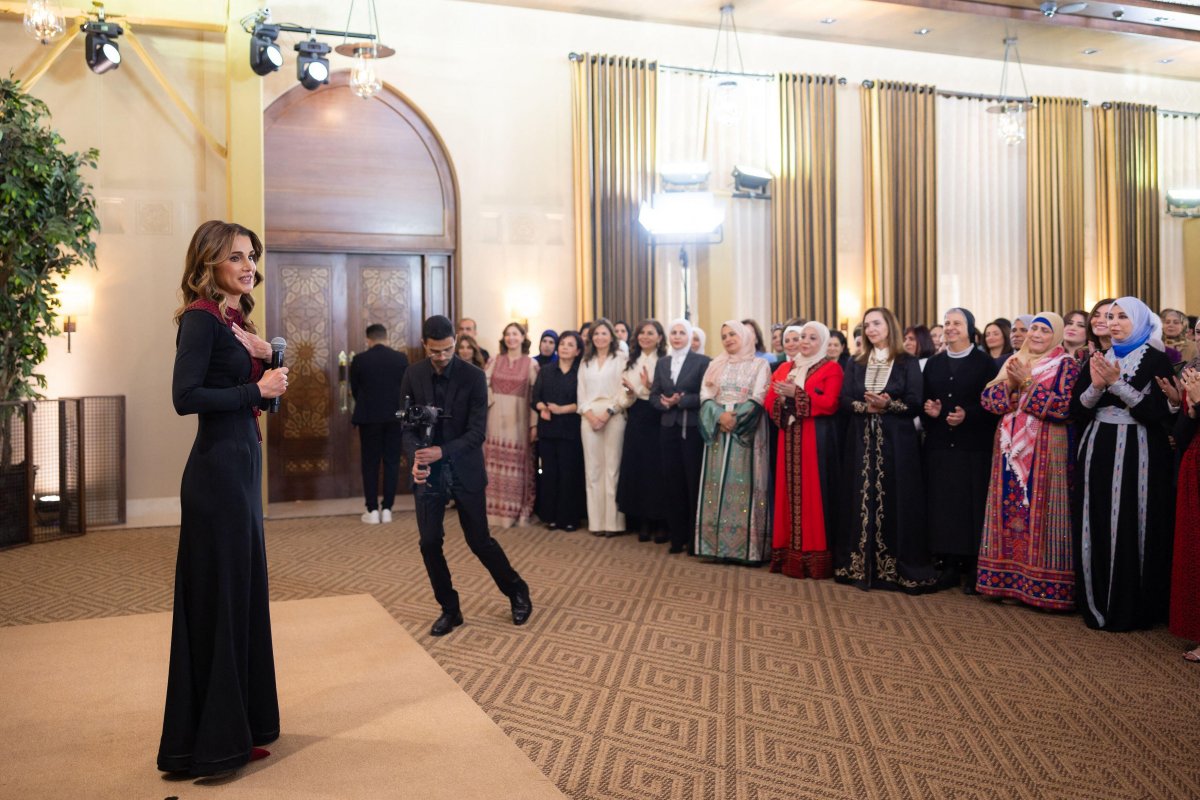The Queen of Jordan receives the insignia of the Order of the Renaissance from her husband, King Abdullah II, on March 6, 2024 (Balkis Press/Abaca Press/Alamy)