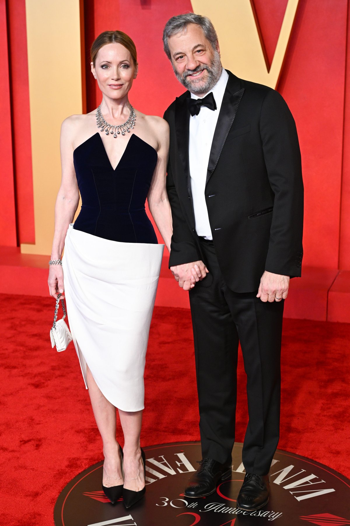 Leslie Mann and Judd Apatow attend the Vanity Fair Oscars Party at the Wallis Annenberg Center for the Performing Arts in Los Angeles on March 10, 2024 (Doug Peters/EMPICS/Alamy)