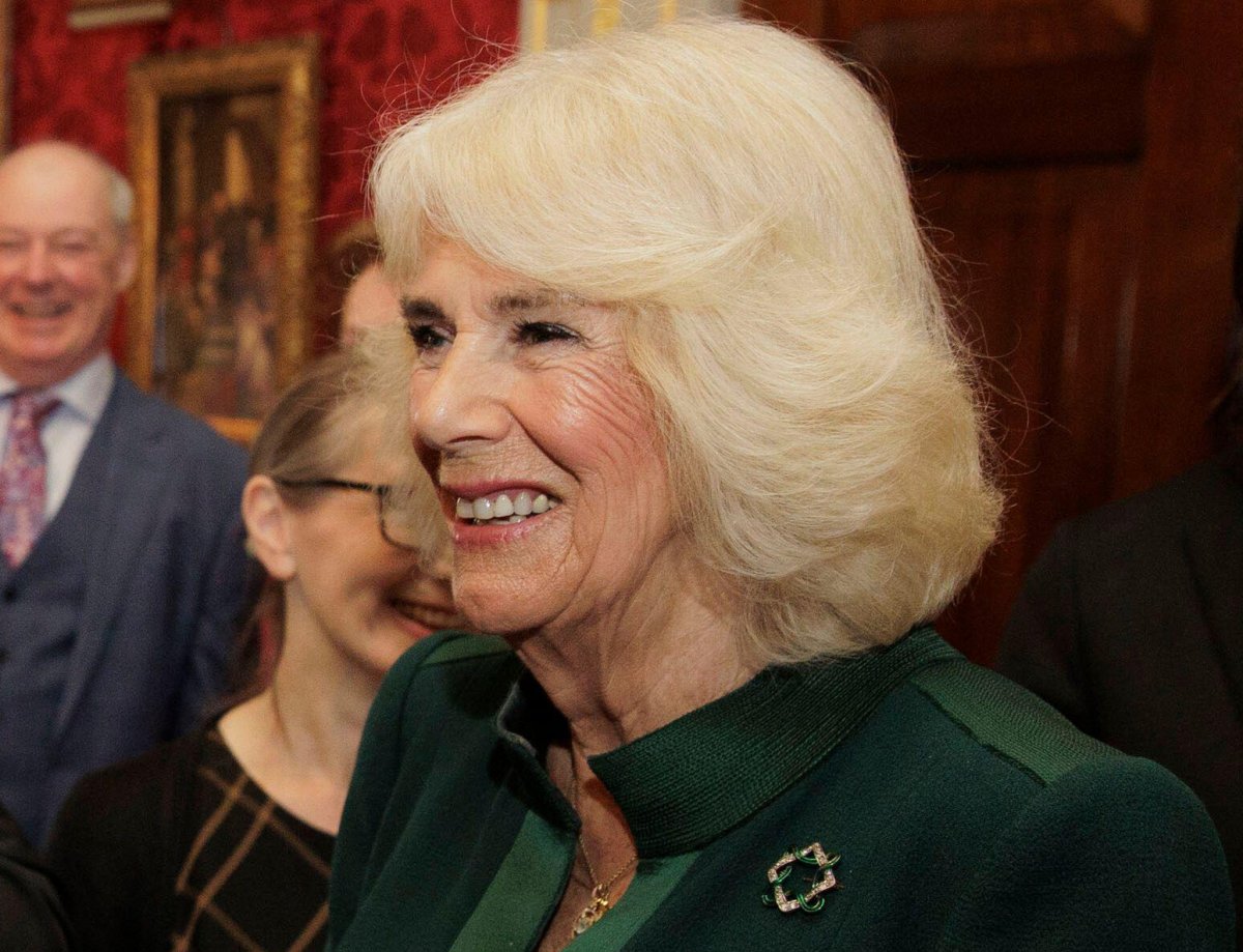 Queen Camilla of the United Kingdom attends a reception in the Queen's Reading Room to mark World Poetry Day at Hillsborough Castle in Belfast on March 21, 2024 (Liam McBurney/PA Images/Alamy)