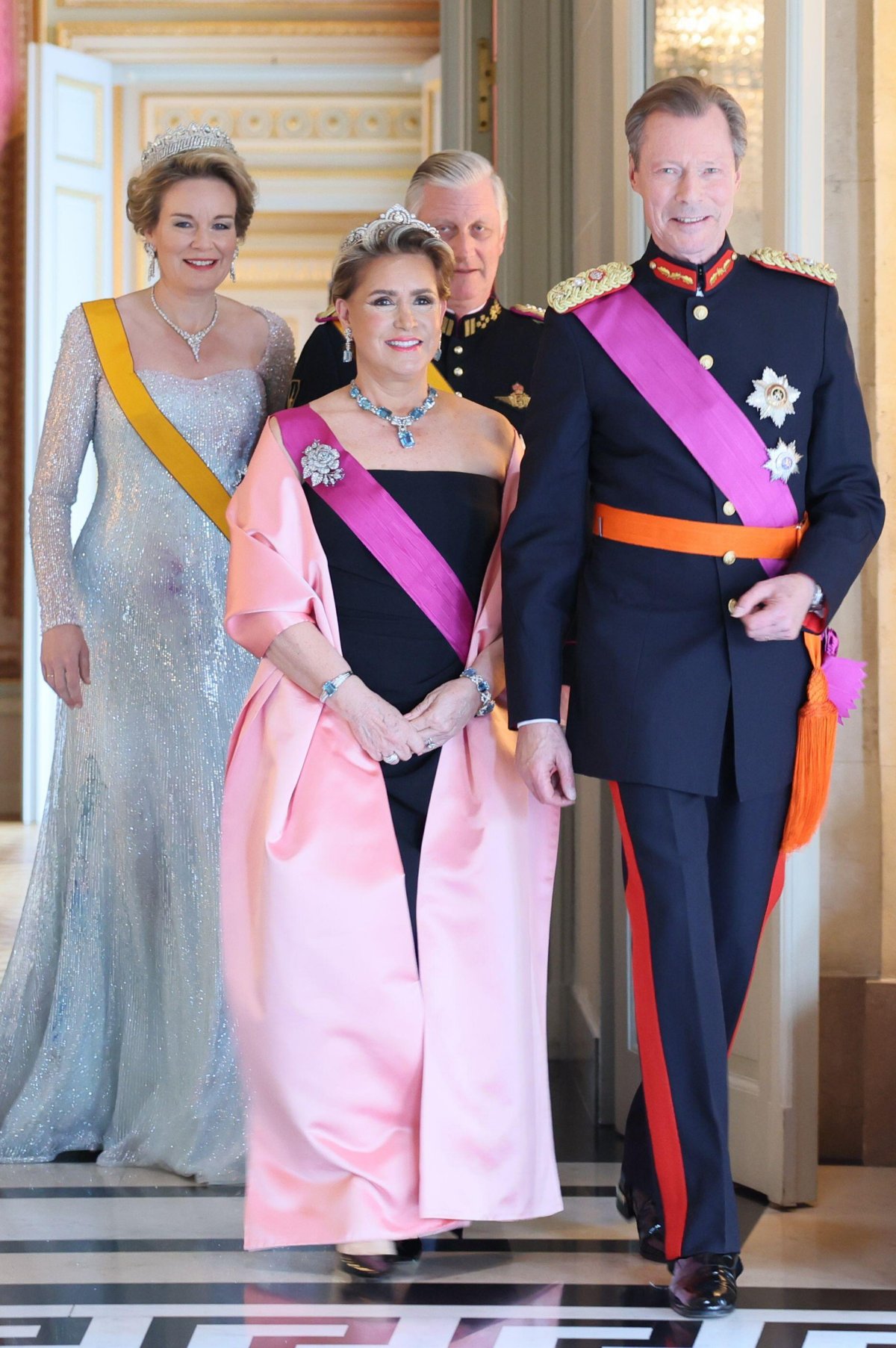 Queen Mathilde of the Belgians, Grand Duchess Maria Teresa of Luxembourg, King Philippe of the Belgians, and Grand Duke Henri of Luxembourg attend a state banquet at the Palace of Laeken on April 16, 2024 (BENOIT DOPPAGNE/Belga News Agency/Alamy)