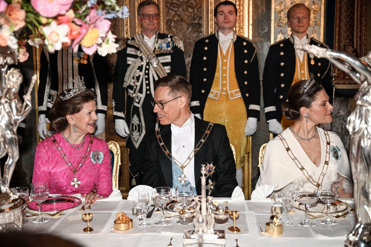 The Queen of Sweden, the President of Finland, and the Crown Princess of Sweden attend a state banquet at the Royal Palace in Stockholm on April 23, 2024 (Fredrik Sandberg/TT News Agency/Alamy)