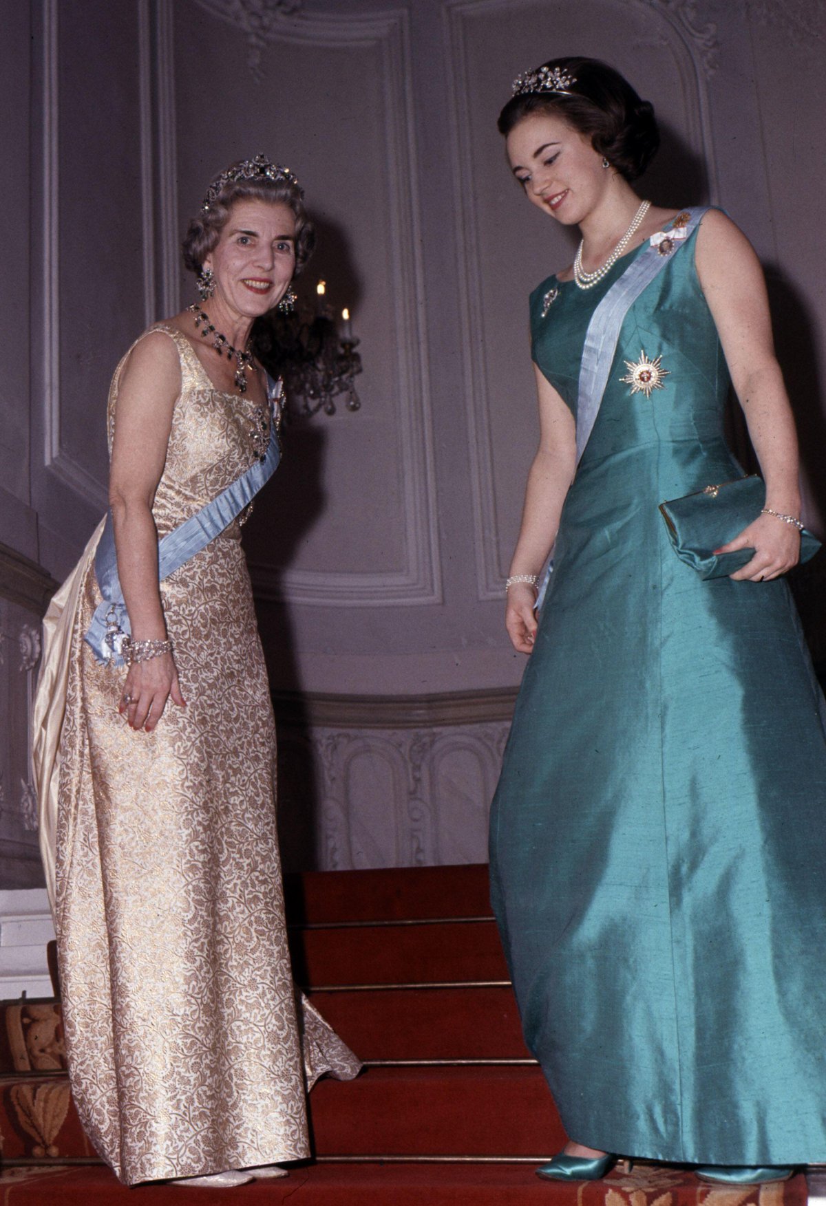 Queen Ingrid of Denmark and her second daughter, Princess Benedikte, attend a gala function at Amalienborg in Copenhagen, ca. 1963 (Jacob Maarbjerg/Ritzau/Alamy)