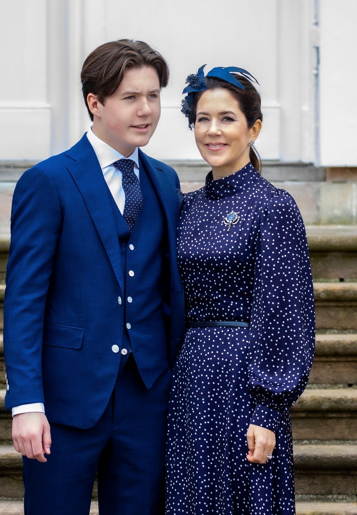 Prince Christian of Denmark poses with his mother, Crown Princess Mary, after his confirmation service at Fredensborg Palace on May 15, 2021 (Albert Nieboer/DPA Picture Alliance/Alamy)
