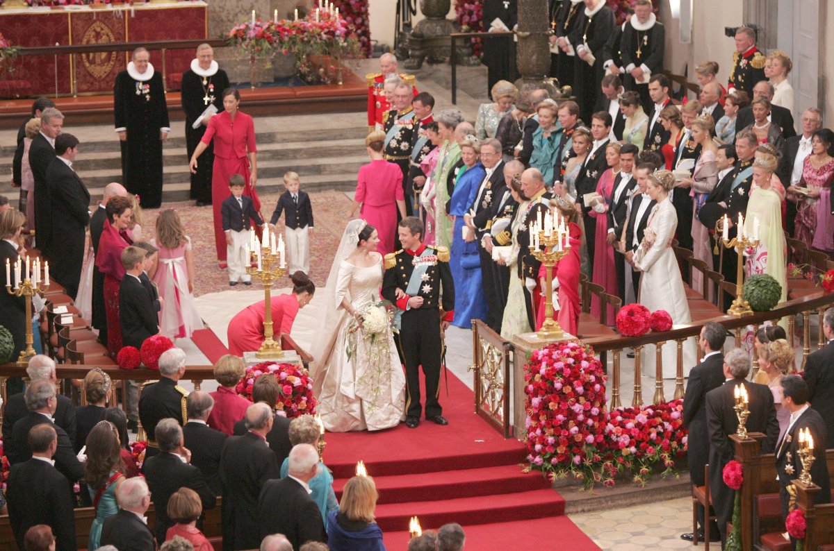 Crown Prince Frederik and Crown Princess Mary of Denmark depart from the cathedral in Copenhagen after their royal wedding on May 14, 2004 (Abaca Press/Alamy)