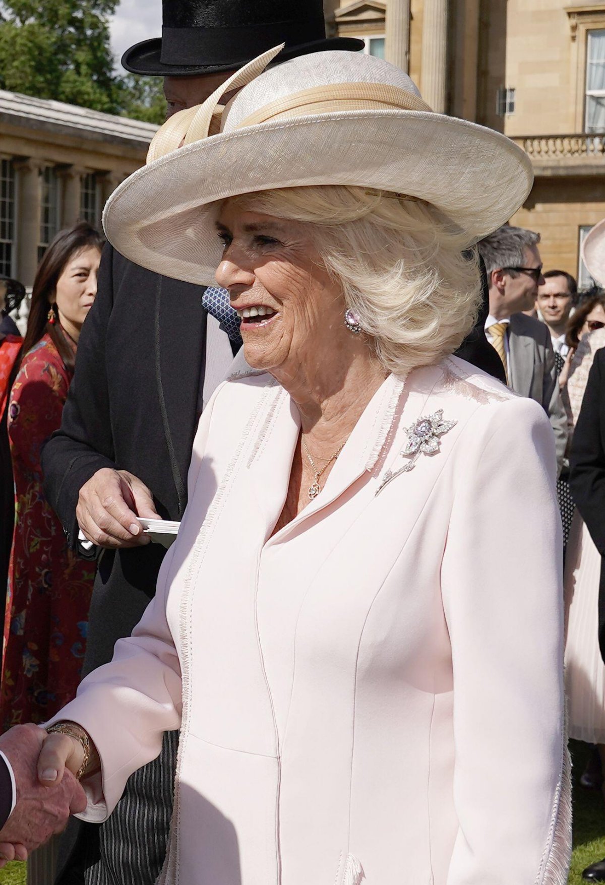Queen Camilla of the United Kingdom attends a garden party at Buckingham Palace in London on May 15, 2024 (Aaron Chown/PA Images/Alamy)