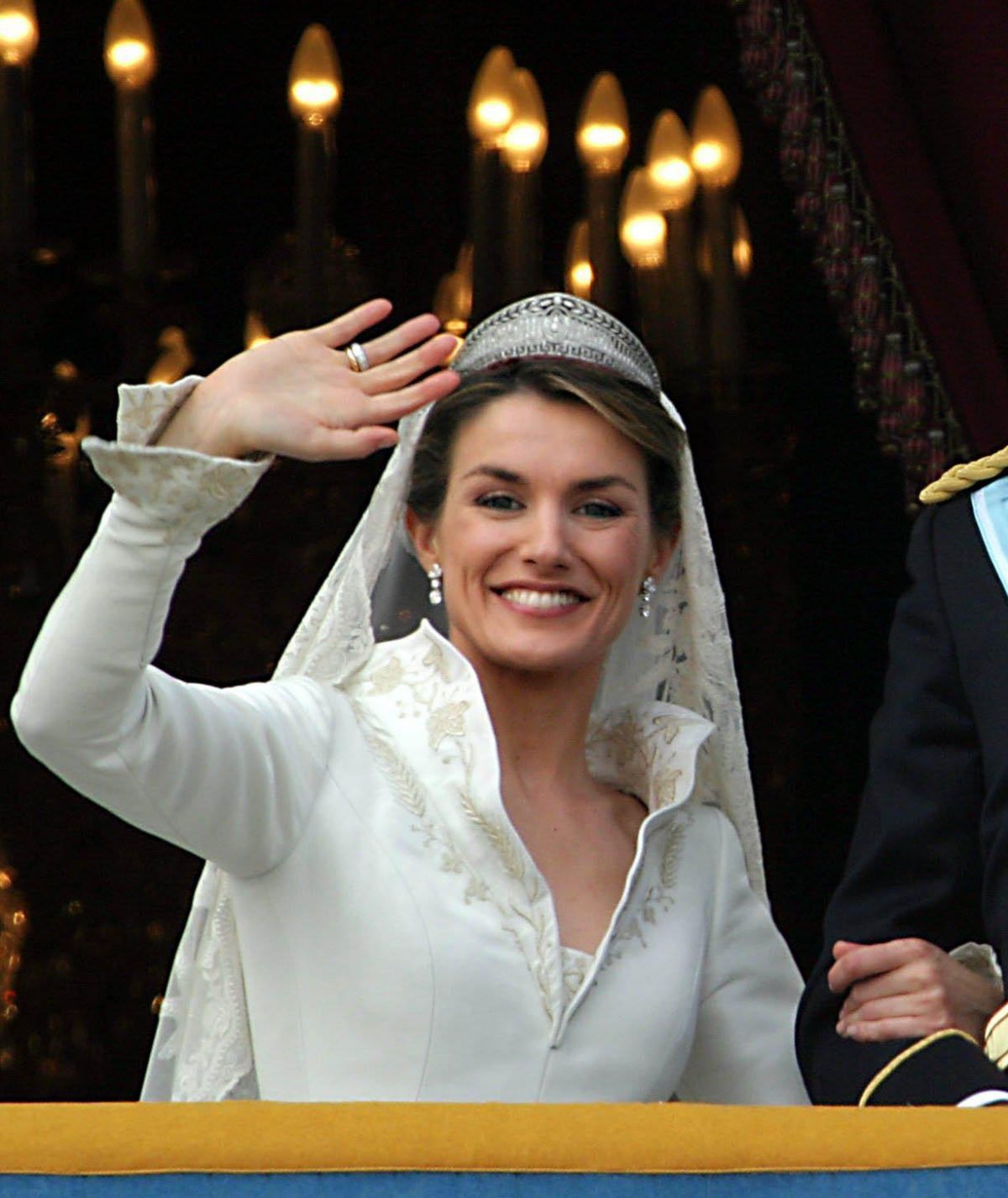 The Princess of Asturias waves from the balcony of the Royal Palace in Madrid after their royal wedding ceremony on May 22, 2004 (DPA Picture Alliance Archive/Alamy)
