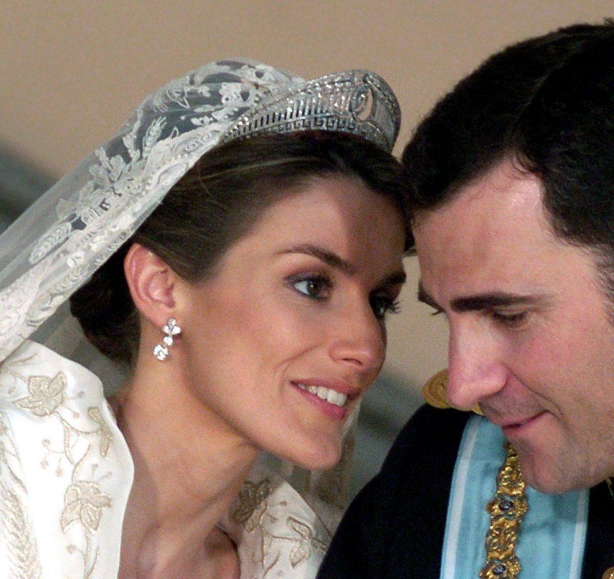 The Prince and Princess of Asturias are pictured during a reception at the Royal Palace in Madrid after their royal wedding ceremony on May 22, 2004 (DPA Picture Alliance Archive/Alamy)