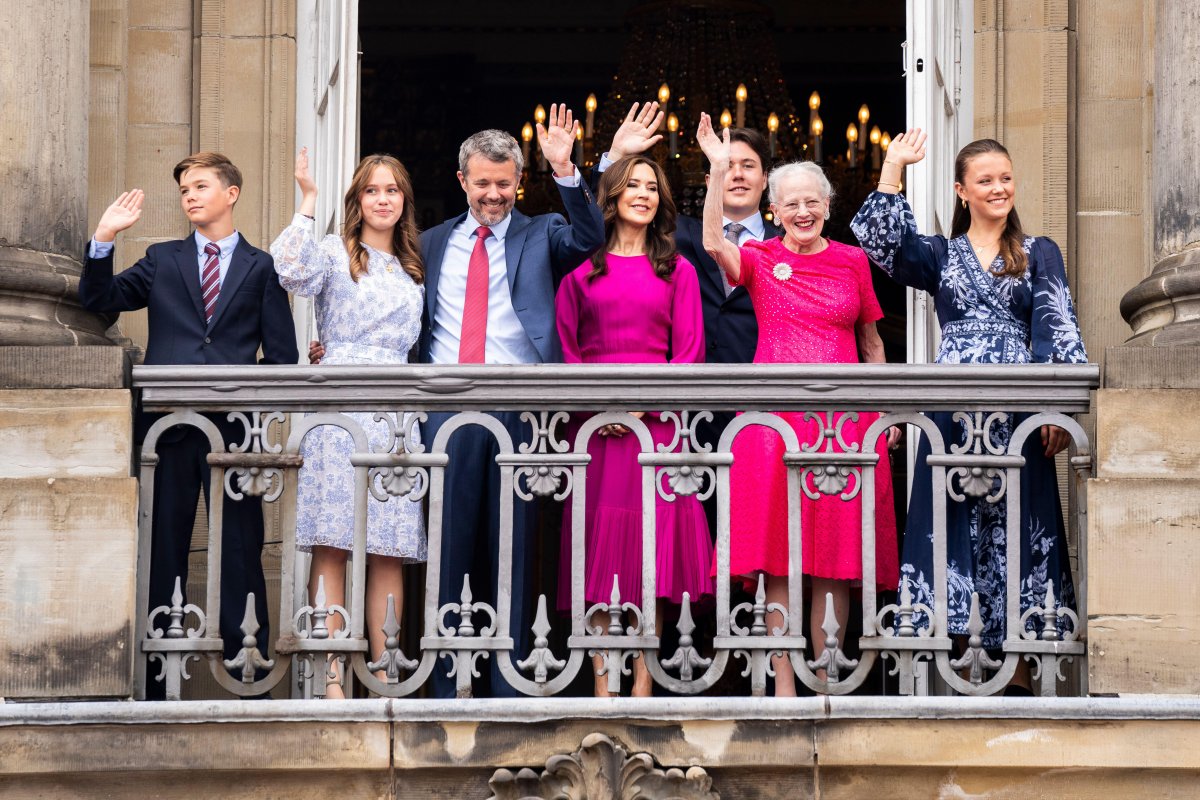 Members of the Danish royal family wave from the balcony of Frederik VIII's Palace at Amalienborg in Copenhagen during the celebrations of King Frederik X's birthday on May 26, 2024 (Ida Marie Odgaard/Ritzau Scanpix/Alamy)