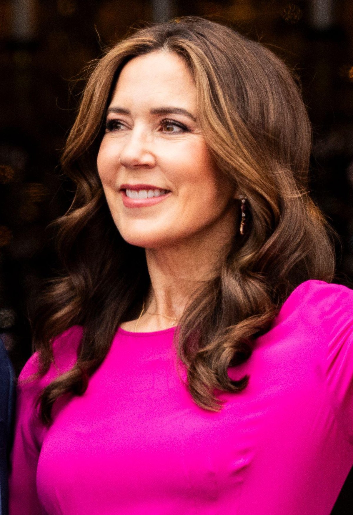 Queen Mary of Denmark waves from the balcony of Frederik VIII's Palace at Amalienborg in Copenhagen during the celebrations of King Frederik X's birthday on May 26, 2024 (Ida Marie Odgaard/Ritzau Scanpix/Alamy)