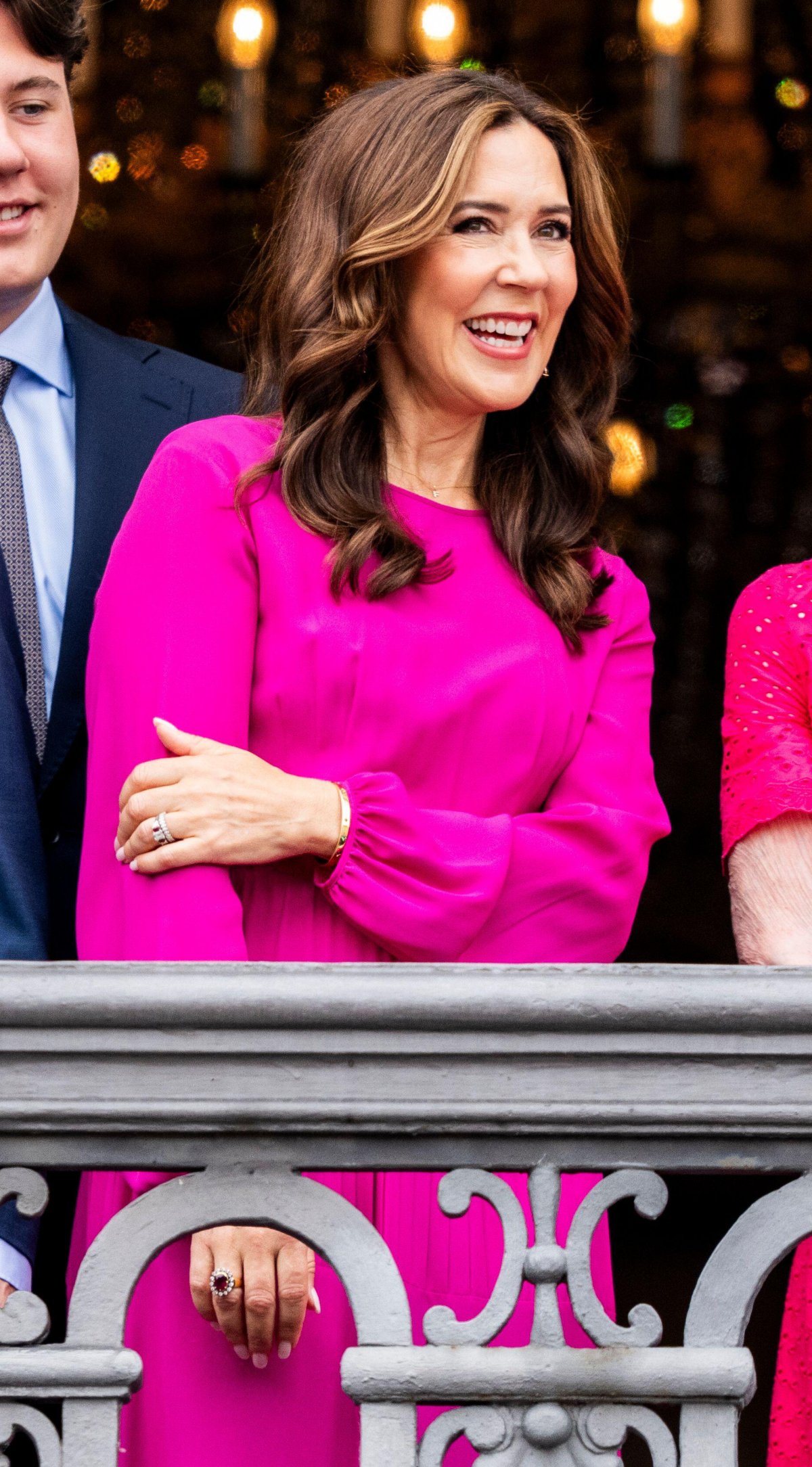 Queen Mary of Denmark waves from the balcony of Frederik VIII's Palace at Amalienborg in Copenhagen during the celebrations of King Frederik X's birthday on May 26, 2024 (Ida Marie Odgaard/Ritzau Scanpix/Alamy)