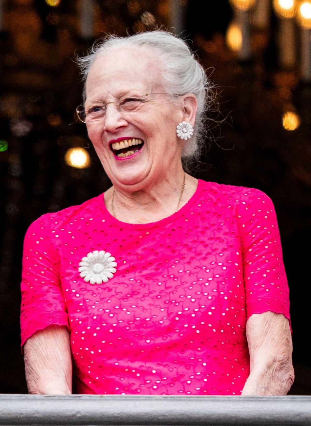 Queen Margrethe of Denmark waves from the balcony of Frederik VIII's Palace at Amalienborg in Copenhagen during the celebrations of King Frederik X's birthday on May 26, 2024 (Ida Marie Odgaard/Ritzau Scanpix/Alamy)