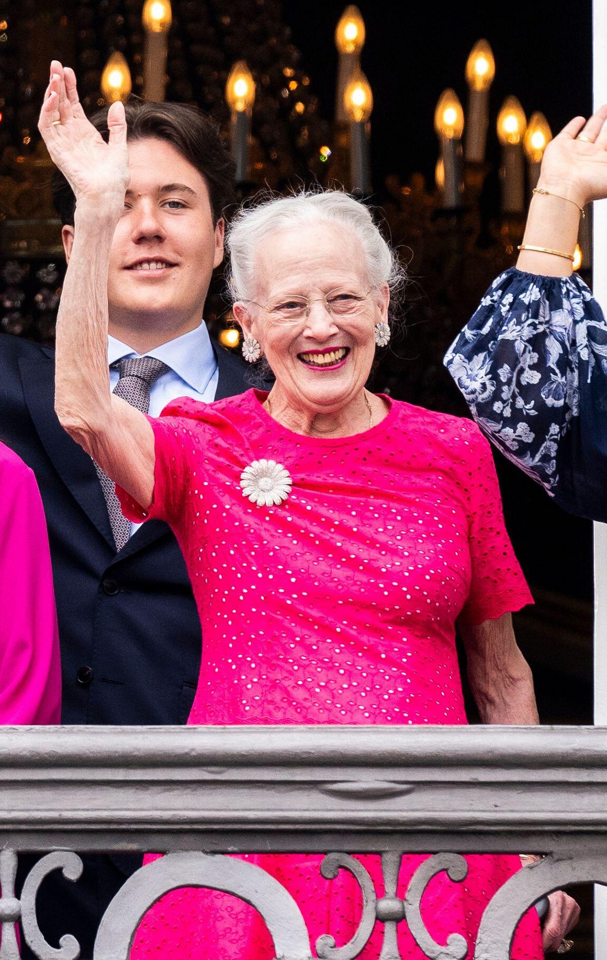 Queen Margrethe of Denmark waves from the balcony of Frederik VIII's Palace at Amalienborg in Copenhagen during the celebrations of King Frederik X's birthday on May 26, 2024 (Ida Marie Odgaard/Ritzau Scanpix/Alamy)