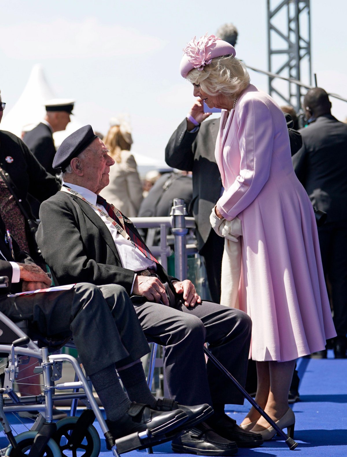 Queen Camilla speaks with D-Day and Normandy veterans following the UK's national commemorative event for the 80th anniversary of D-Day on Southsea Common in Portsmouth on June 5, 2024 (Andrew Matthews/PA Images/Alamy)