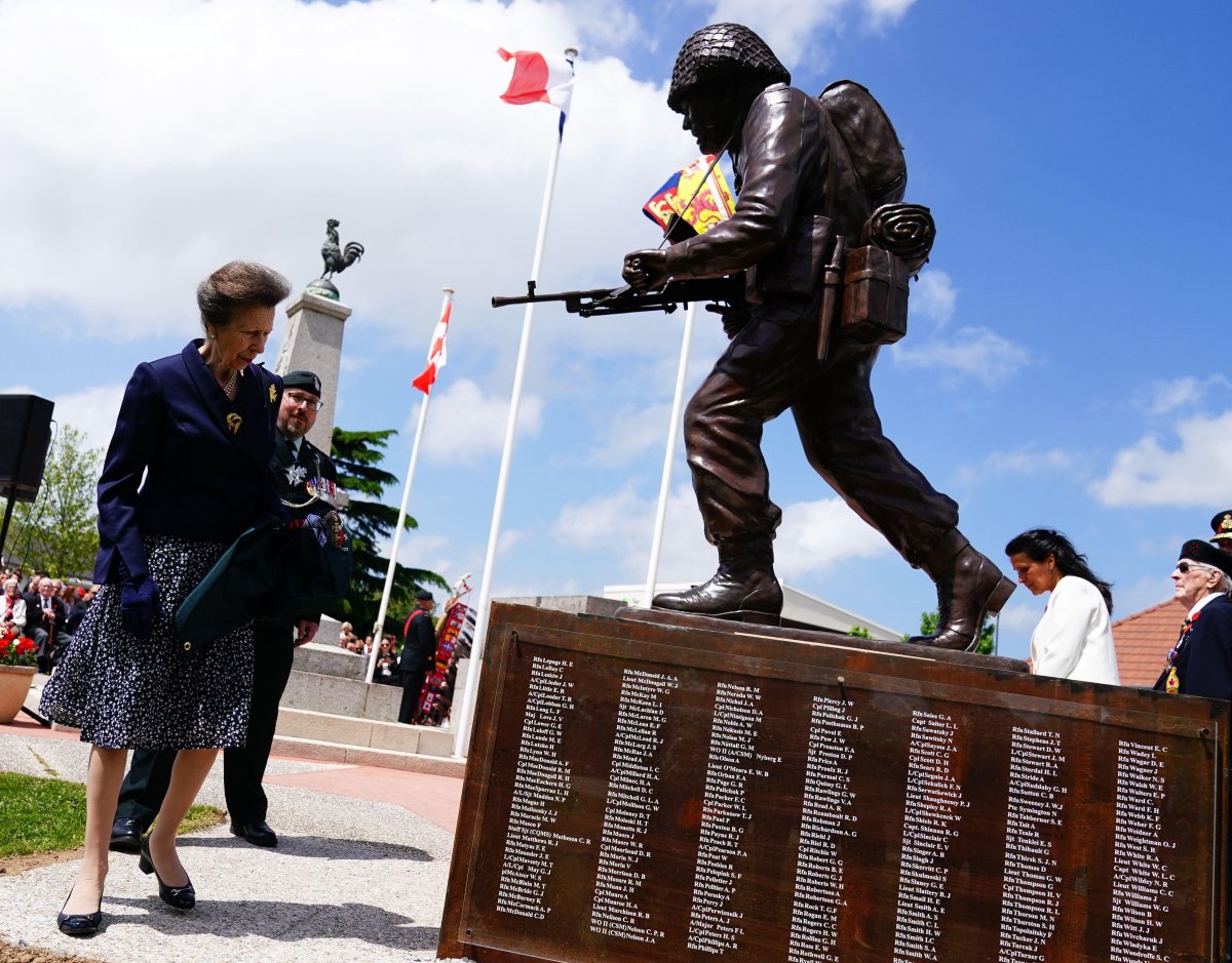 The Princess Royal, Colonel-in-Chief of the Royal Regina Rifles, unveils a statue of a World War II Canadian Royal Regina Rifleman during a reception with members of the regiment to mark the 80th anniversary of D-Day at Place des Canadiens in Bretteville-l'Orgueilleuse, Normandy on June 5, 2024 (Aaron Chown/PA Images/Alamy)