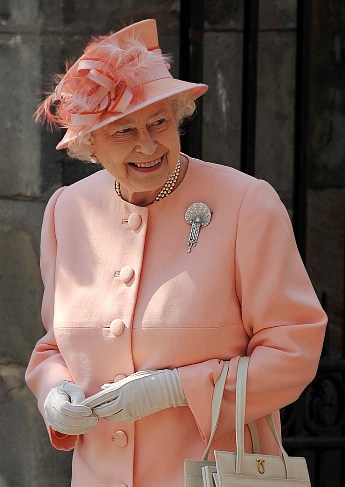 Queen Elizabeth II is pictured after the wedding of her granddaughter, Zara Phillips, and Mike Tindall at Canongate Kirk in Edinburgh on July 30, 2011 (BEN STANSALL/AFP via Getty Images)