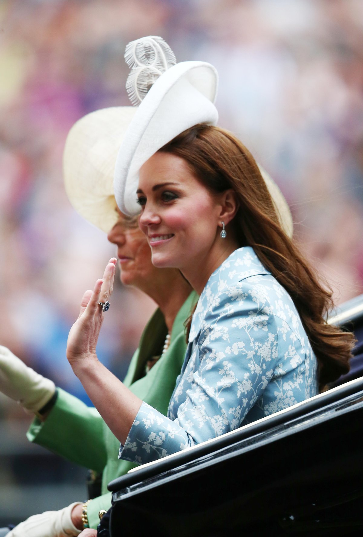 The Duchess of Cornwall and the Duchess of Cambridge ride in a carriage during the Trooping the Colour festivities in London on June 13, 2015 (WENN Rights Ltd/Alamy)