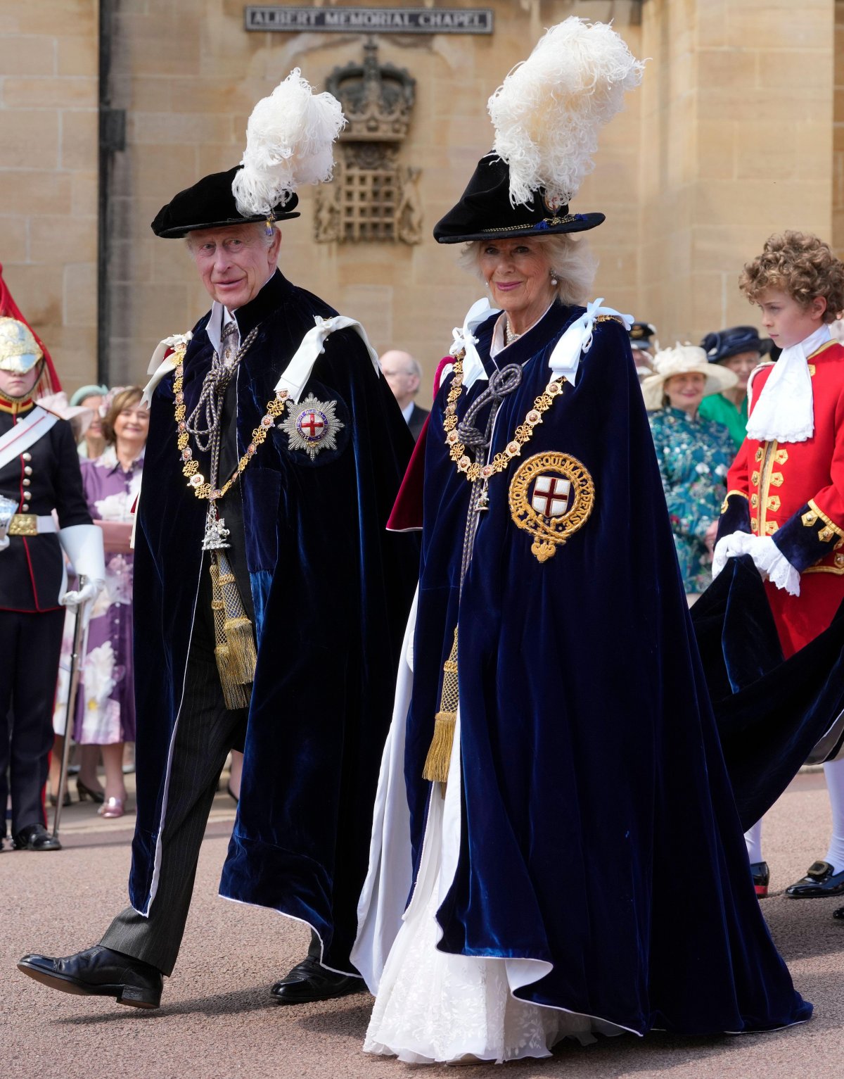 King Charles III and Queen Camilla arrive for the annual Order of the Garter service at St. George's Chapel, Windsor on June 17, 2024 (Kirsty Wigglesworth/PA Images/Alamy)