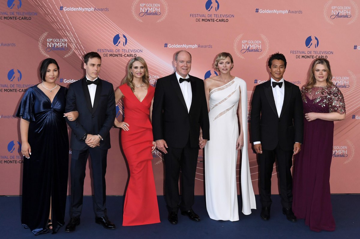 The Prince and Princess of Monaco, with Marie and Louis Ducruet, the actress Fiona Gubelmann, the actor Will Yun Lee, and Camilla Gottlieb, attend the Golden Nymph Awards at the 63rd annual Monte-Carlo International Television Festival on June 18, 2024 (Independent Photo Agency/Alamy)