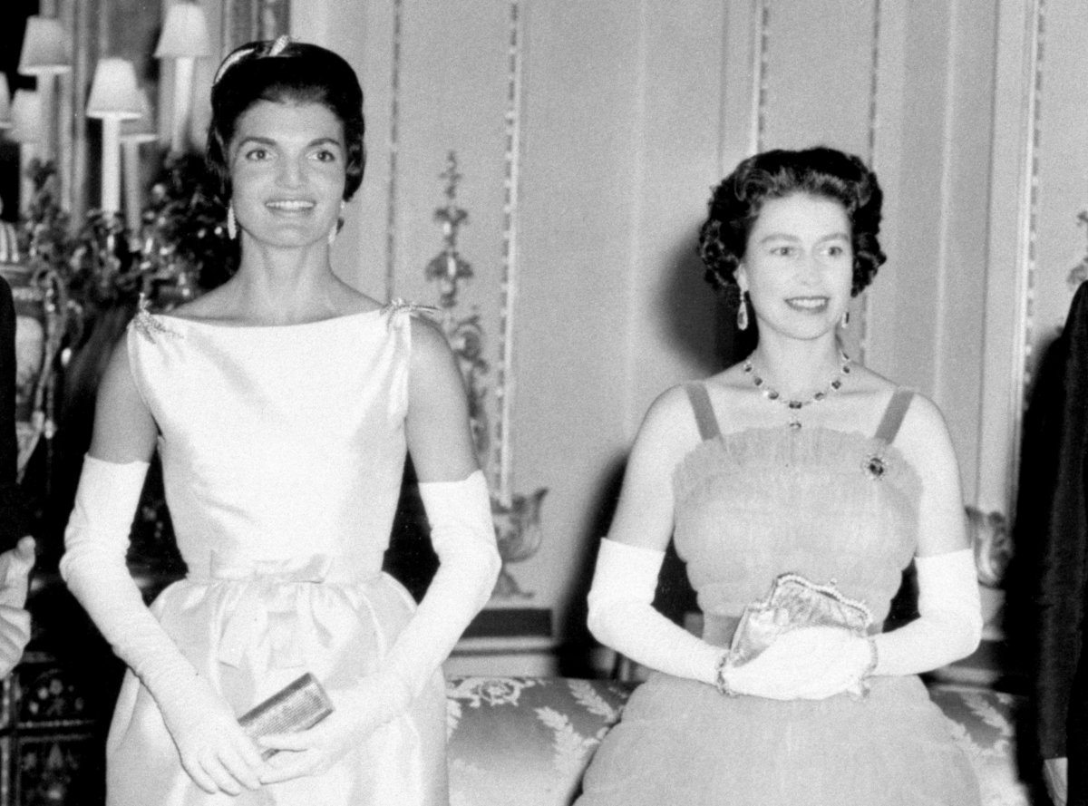 First Lady Jacqueline Kennedy and Queen Elizabeth II are pictured ahead of a dinner at Buckingham Palace in London on June 5, 1961 (PA Images/Alamy)