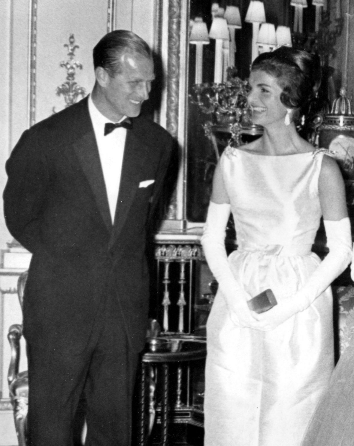 The Duke of Edinburgh and First Lady Jacqueline Kennedy are pictured ahead of a dinner at Buckingham Palace in London on June 5, 1961 (Keystone Press/Alamy)