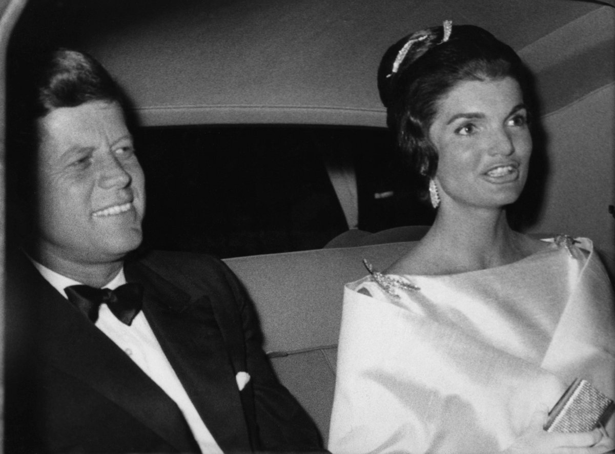 President John F. Kennedy and First Lady Jacqueline Kennedy leave the home of her sister, Lee Radziwill, en route to a dinner at Buckingham Palace in London on June 5, 1961 (Keystone Press/Alamy)