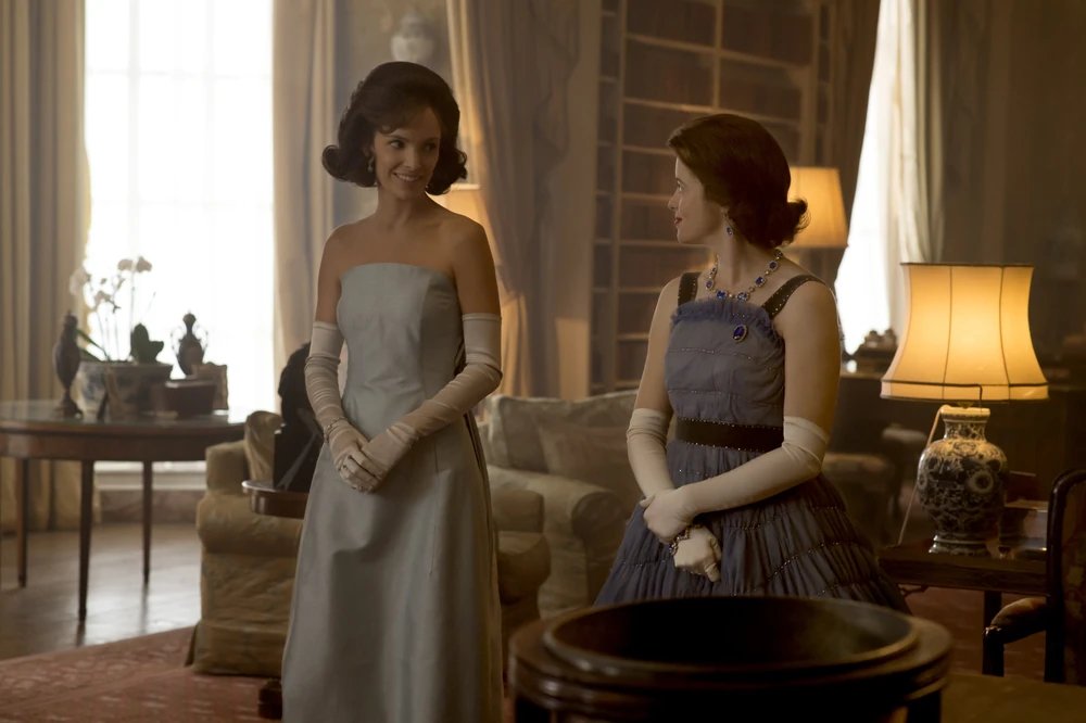 Jacqueline Kennedy (Jodi Balfour) and Queen Elizabeth II (Claire Foy) have dinner at Buckingham Palace in "Dear Mrs. Kennedy," a season two episode of The Crown (Netflix)