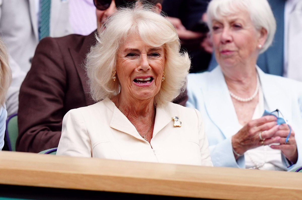 Queen Camilla watches from the Royal Box on day ten of the Wimbledon Championships at the All England Lawn Tennis and Croquet Club on July 10, 2024 (Mike Egerton/PA Images/Alamy)