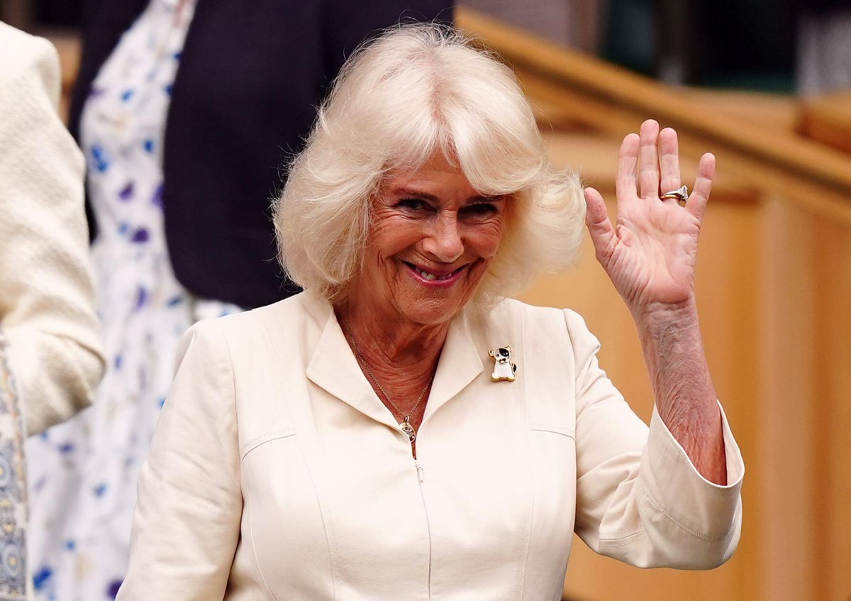 Queen Camilla watches from the Royal Box on day ten of the Wimbledon Championships at the All England Lawn Tennis and Croquet Club on July 10, 2024 (Mike Egerton/PA Images/Alamy)
