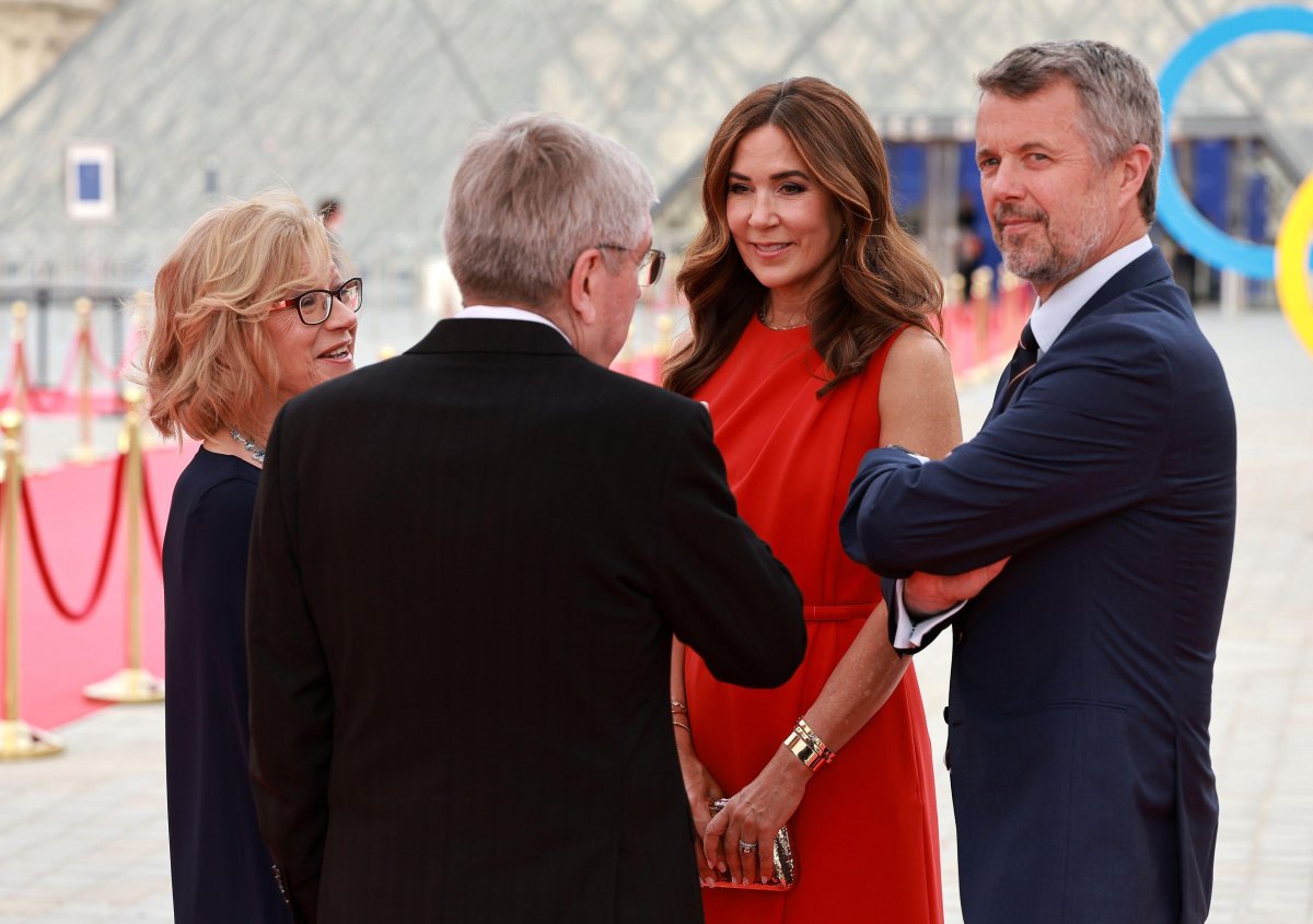 The King and Queen of Denmark are greeted by Thomas and Claudia Bach as they arrive for a gala dinner hosted by the International Olympic Committee and the French Presidency at the Louvre Museum in Paris on July 25, 2024 (Arturo Holmes/Xinhua/Alamy)