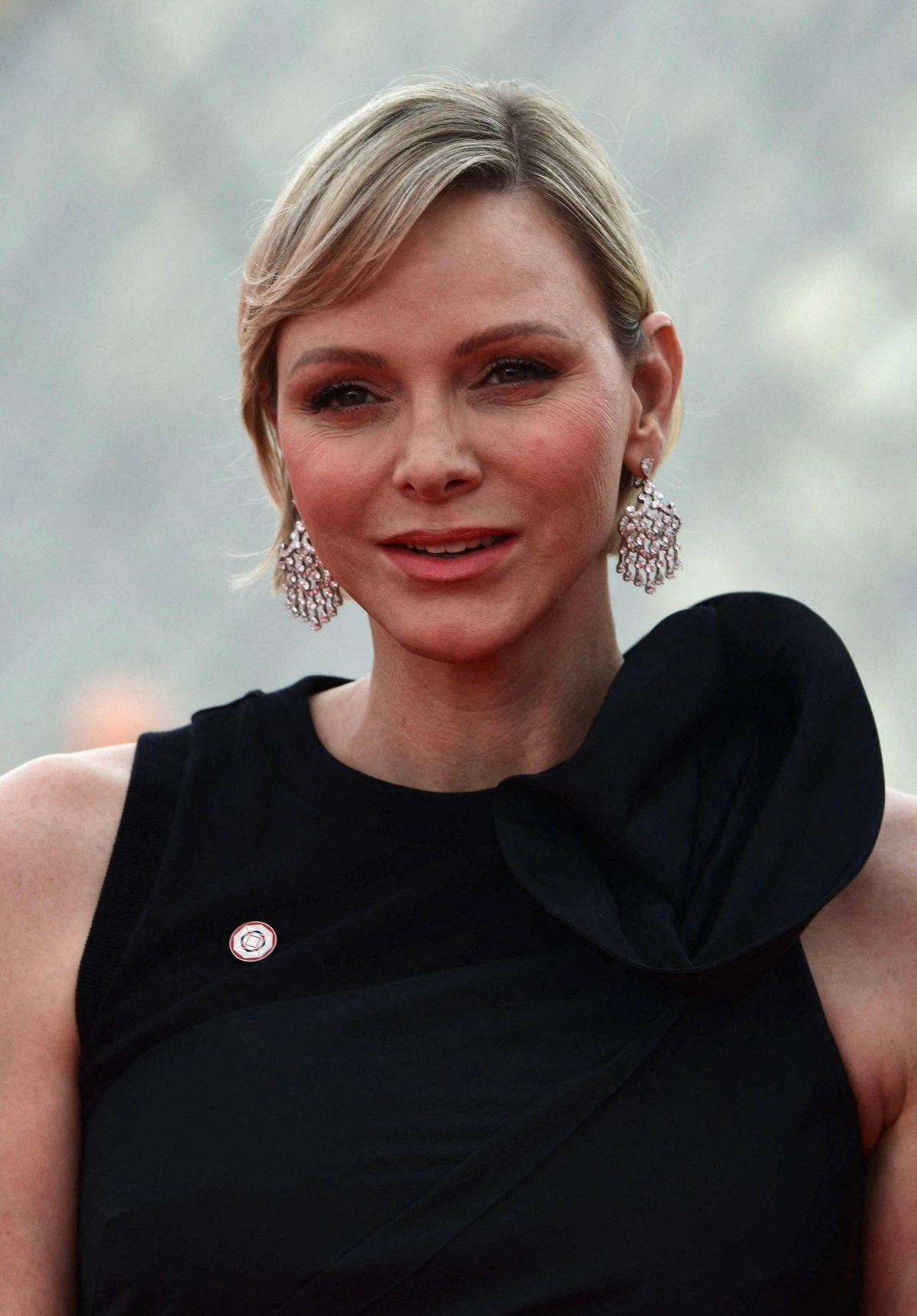 The Princess of Monaco arrives for a gala dinner hosted by the International Olympic Committee and the French Presidency at the Louvre Museum in Paris on July 25, 2024 (Jeanne Accorsini/Abaca Press/Alamy)