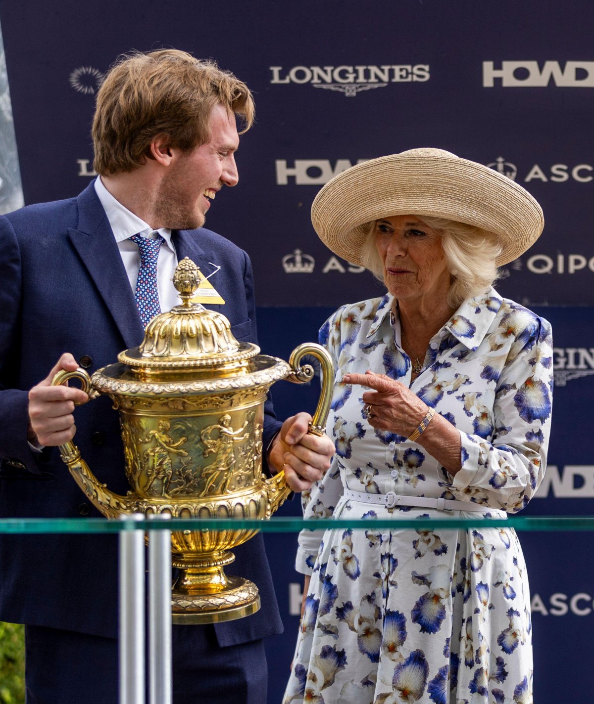 Queen Camilla presents the trophy for for the King George VI And Queen Elizabeth Qipco Stakes at Ascot Racecourse on July 27, 2024 (Steven Paston/PA Images/Alamy)