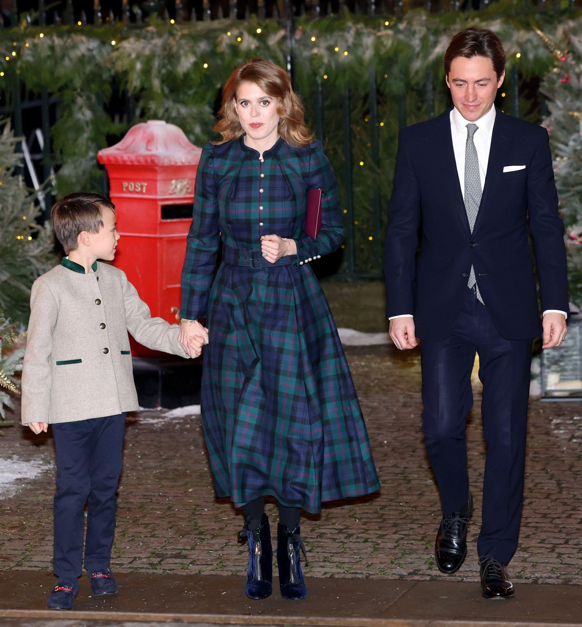 Princess Beatrice of York and Edoardo Mapelli Mozzi, with Christopher Woolf Mapelli Mozzi, attend the Carols: Together at Christmas service at Westminster Abbey in London on December 8, 2023 (Chris Jackson/PA Images/Alamy)