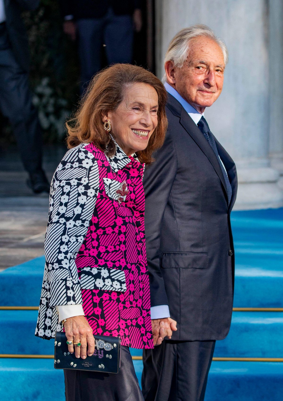 Prince Michael of Greece and Denmark and his wife, Marina, attend the wedding of Prince Philippos and Princess Nina of Greece and Denmark in Athens on October 23, 2021 (Albert Nieboer/DPA Picture Alliance/Alamy)