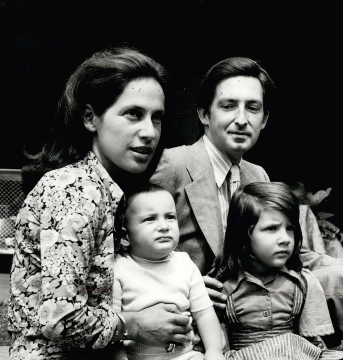 Prince Michael of Greece and Denmark poses with his wife, Marina, and their daughters, Princess Alexandra and Princess Olga, at their home in Marousi in 1972 (Keystone Pictures/Alamy)