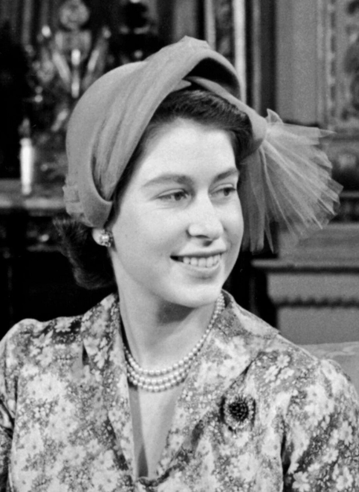 Princess Elizabeth poses for portraits after the christening of Princess Anne at Buckingham Palace on October 21, 1950 (PA Images/Alamy)
