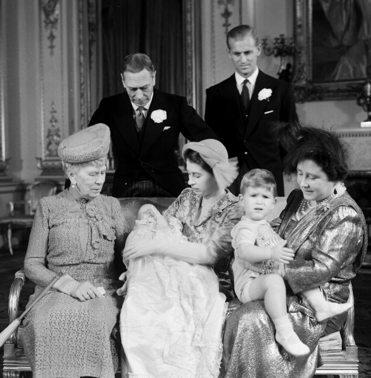 Members of the British royal family pose for portraits after the christening of Princess Anne at Buckingham Palace on October 21, 1950 (PA Images/Alamy)