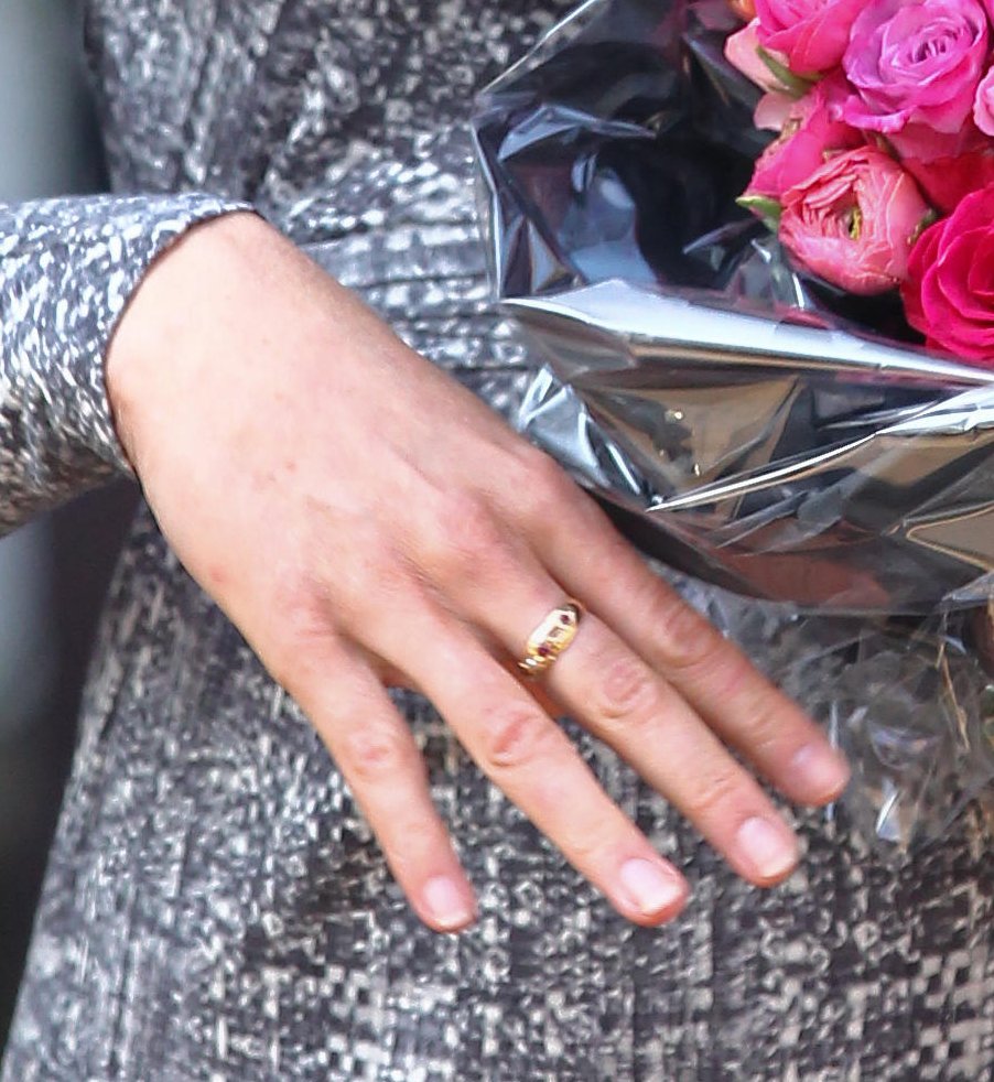 The Duchess of Cambridge departs after a visit to Hope House in London on February 19, 2013 (WENN/Alamy)