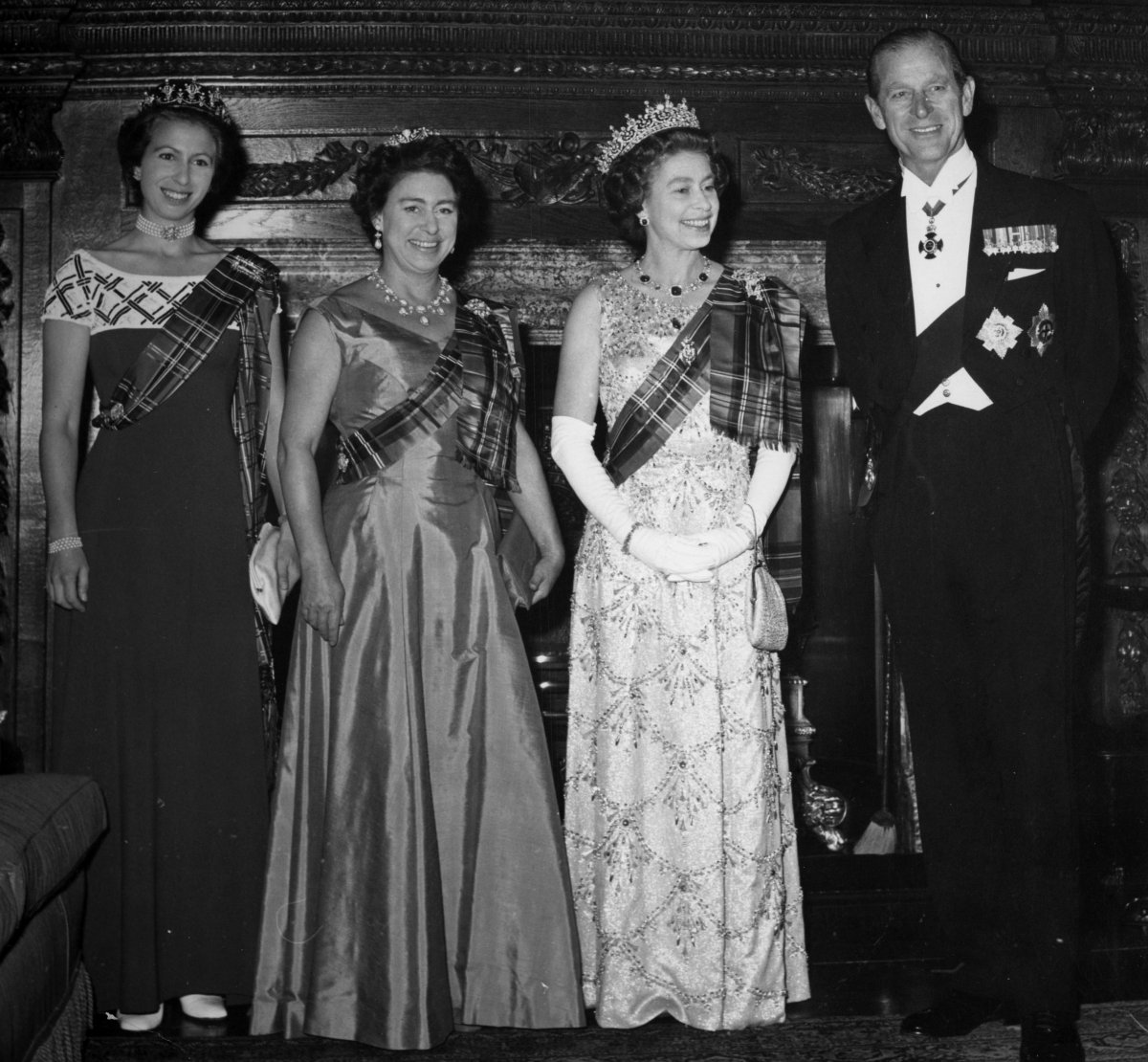 Princess Anne, Princess Margaret, Queen Elizabeth II, and Prince Philip attend the Royal Company of Archers Ball in Edinburgh on October 19, 1976 (PA Images/Alamy)