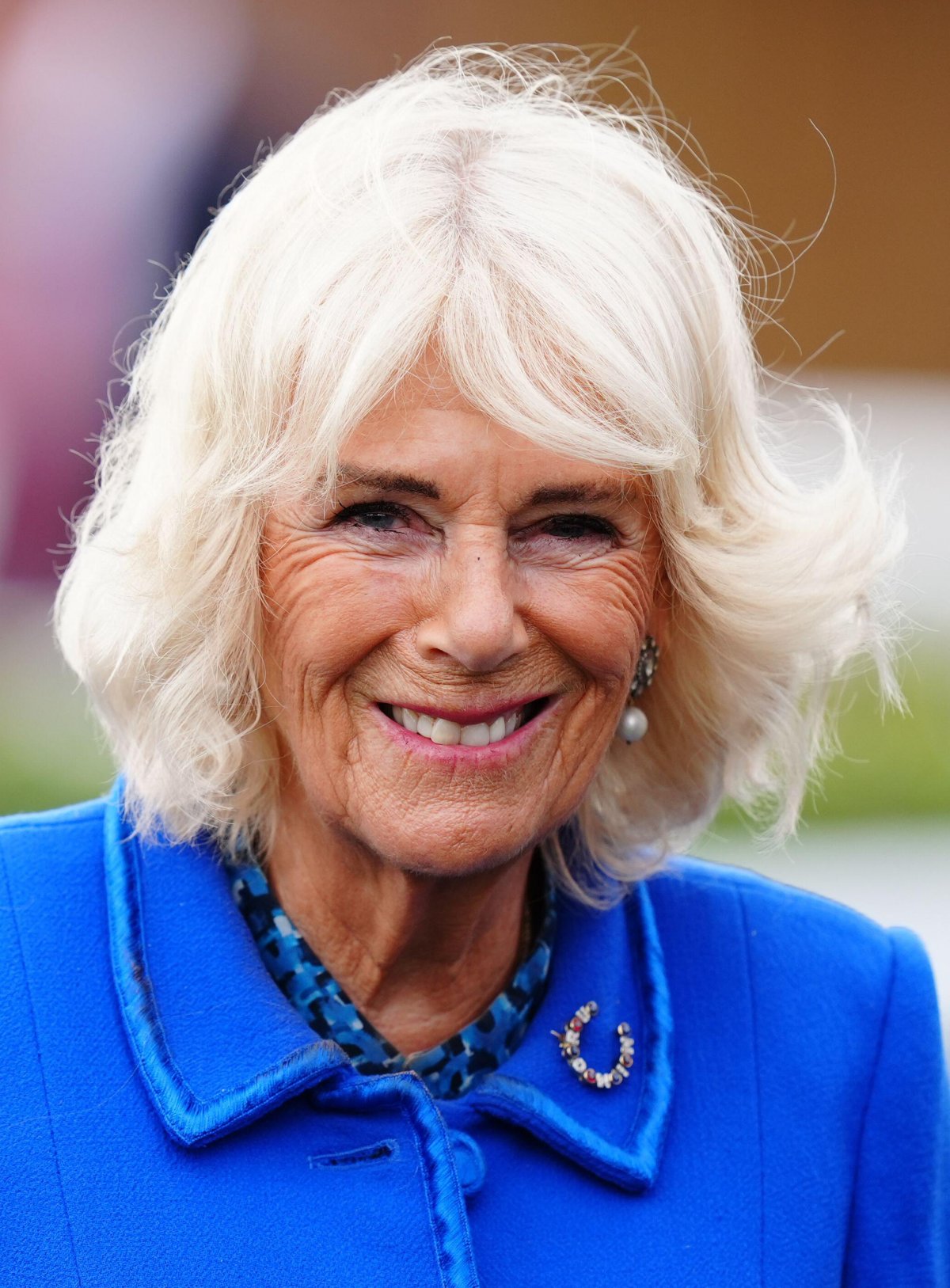 Queen Camilla attends the third day of the Sky Bet Ebor Festival at York Racecourse on August 23, 2024 (Mike Egerton/PA Images/Alamy)