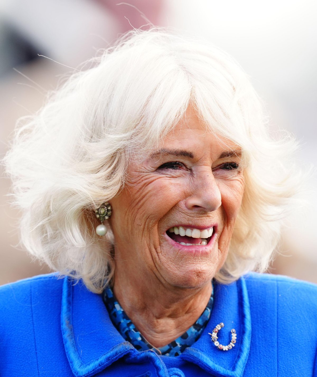 Queen Camilla attends the third day of the Sky Bet Ebor Festival at York Racecourse on August 23, 2024 (Mike Egerton/PA Images/Alamy)