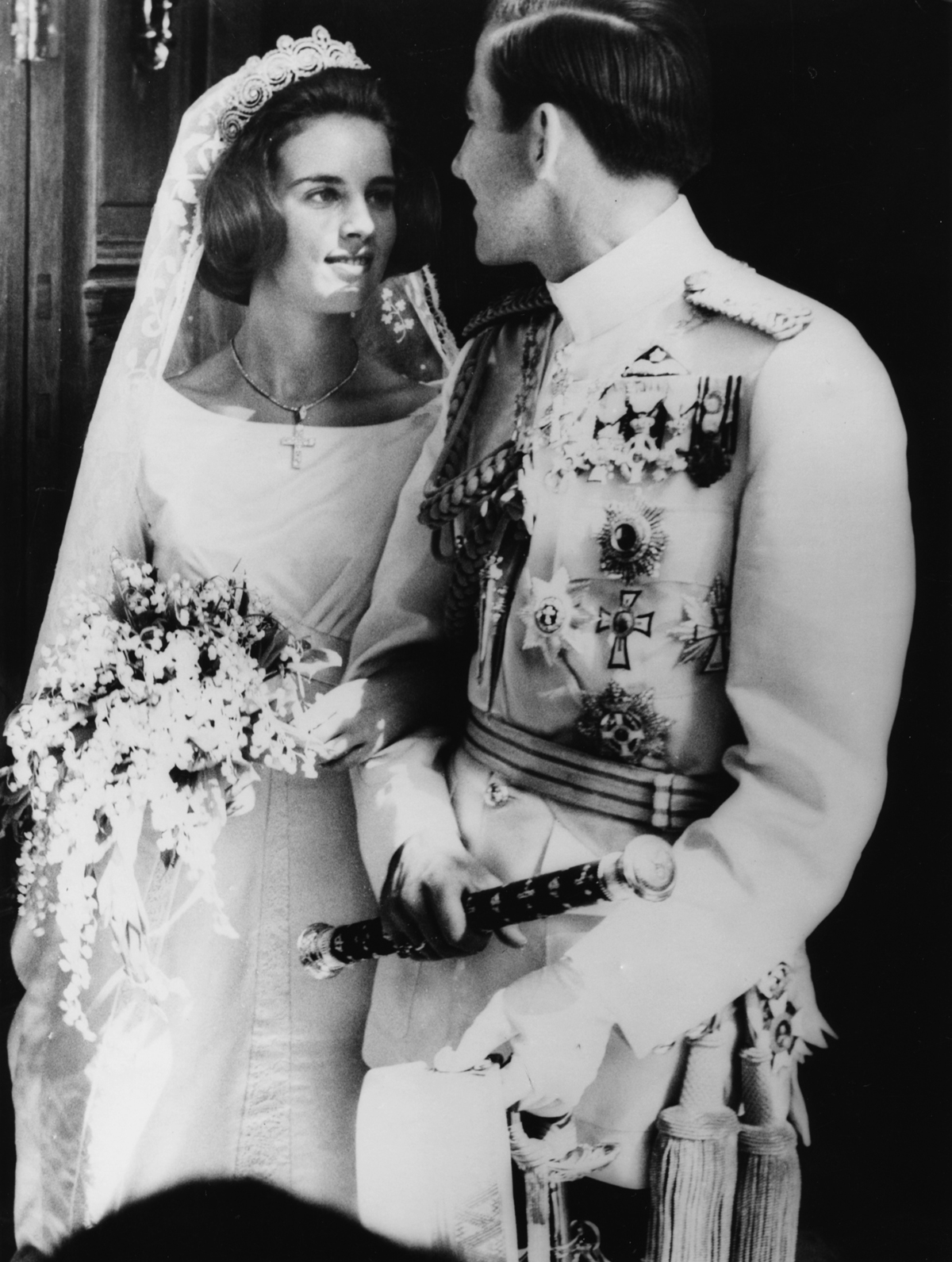 King Constantine II and Queen Anne-Marie of the Hellenes on their wedding day at the Metropolitan Cathedral in Athens on September 18, 1964 (Central Press/Hulton Archive/Getty Images)